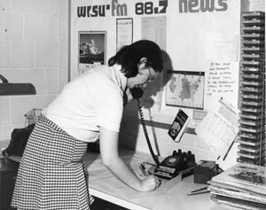 Helena Tennabaum in the News Room - Notice the Calender May 1977